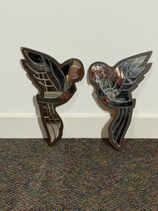Pieces of Glass on a Piece of Wood Shaped Like a Parrot