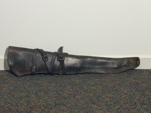 Vintage military leather rifle scabbard, most likely a U.S. WWII M1 Garand Leather Jeep Scabbard.