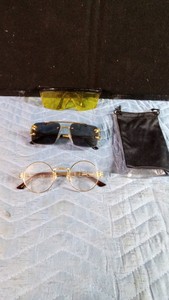 Goggles with pouch, sun glasses and a pr of reading glasses