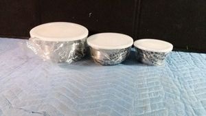 3 metal bowls with lids