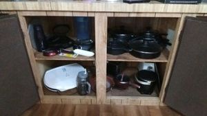 cupboard full of pots and pans and more - bring boxes and must take all
