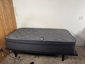 Twin Adjustable motorized bed base controlled by a wireless remote control.