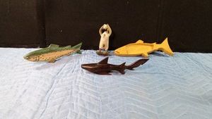 3 Hand-carved wooden fish and 1 hand-carved wooden duck