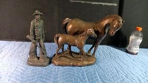 Cold case ceramic Michael Garman sculpture titled  Scout or Cowboy with Rifle and a ceramic mare & colt sculpture
