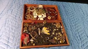 wood hinged box of jewelry