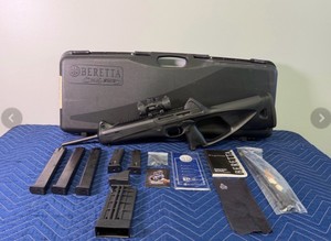 Beretta Cx4 Storm semi-automatic carbine rifle chambered in 9mm with Leapers UTG red dot sight, manual, case, cleaning kit, 5 magazines, speed loader and More - Permit and Background Check Required - See description for more info