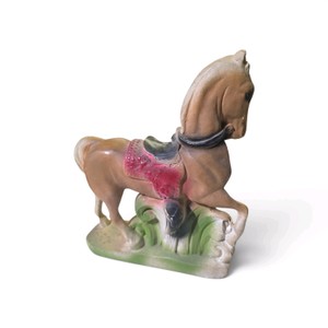 Vintage chalkware piece designed to resemble a saddled carousel horse, commonly found as carnival prizes during the 1940s or 1950s