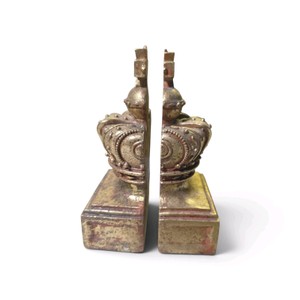 Vintage Roman helmet bookends by the House of Borghese, featuring a gilt finish valued at $250