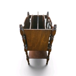 Vintage Butler-style mahogany wood magazine rack features distinctive spindle supports and a handled top for portability.