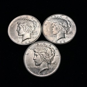 Lot of (3) Peace Dollars 90% Silver Content Years 1922, 1922, and 1926