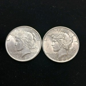 Nice pair of 1923 90% silver content USA Peace Dollars