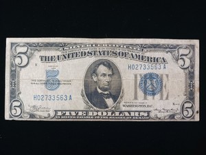 Series 1934-A $5 Silver Certificate featuring a distinct blue Treasury seal