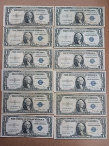 Lot of (12) Total Currency Bills  Series 1935E (Some are start notes)