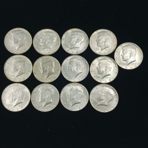 Lot of (13) total Kennedy Half Dollars all from the year 1969 (40% silver content)