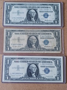 Lot of (3) 1957 Series  x 2 and 1957A x 1  $1 United States Silver Certificates - Blue Seals (Circulated)