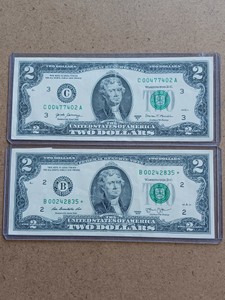 Lot of 2 Crisp $2 Federal Reserve Notes  Includes Star Note