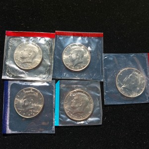 Collection of (5) Uncirculated Kennedy Half Dollars - Cut from US Mint Sets