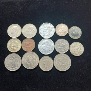 14-piece collection of international coins and tokens