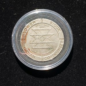 Vintage $1 gaming token from Jackpot Junction Bingo & Casino, located in Morton, Minnesota.