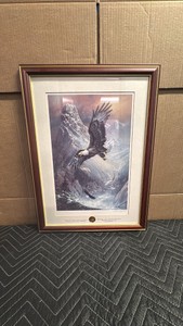 Framed collectible is Save the Eagle, Proud and Free, a signed limited-edition print by artist Ted Blaylock issued by the Franklin Mint, featuring an embedded 24-karat gold-plated medallion seal and a certificate of authenticity