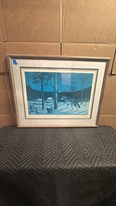 Framed wildlife art print is titled Old Three Legs by renowned Minnesota artist Les Kouba, depicting a legendary timber wolf near a snowy farmstead.