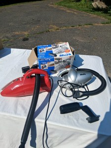 BRAND NEW HANDHELD VACUUMS, DIRT DEVIL AND SHARK