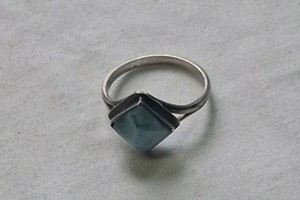 BEAUTIFUL STERLING SILVER RING WITH A BLUISH COLOR STONE.  SIZE 9