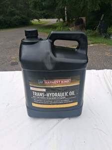NEARLY FULL JUG OF HYDRAULIC OIL, 2 GALLONS, JOHN DEERE
