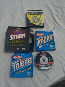 LARGE GROUP OF FISHING LINE IN THE BOXES
