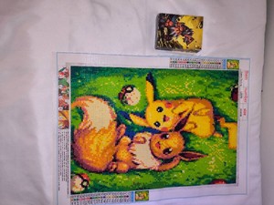 Pokmon TCG, sun and Moon cosmic eclipse towering Heights themed deck, and Eevee and Pikachu diamond painting