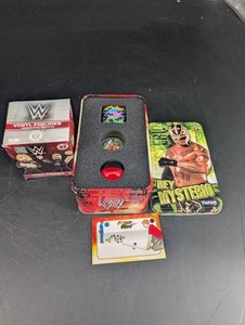 WWE Collectibles Mixed Lot Rey Mysterio, WrestleMania Tin & Vinyl Figures