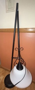 Black Metal Floor Lamp with Frosted Glass Shade Scroll Accent