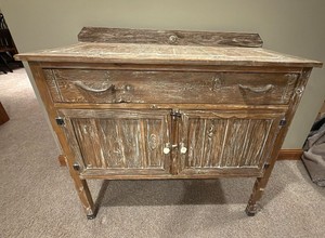 rustic cabinet with antler drawer pulls