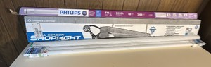 three shop lights with extra bulbs
