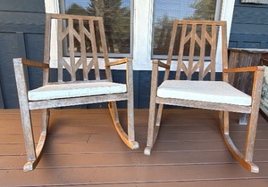 two wooden porch rocking chairs