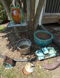 lawn art collection including a ceramic pot table and very cute frog plus some other miscellaneous treasures