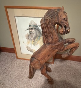 hand carved carved bucking horse and cowboy picture