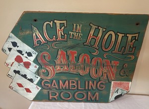 ace in the hole saloon gambling room sign