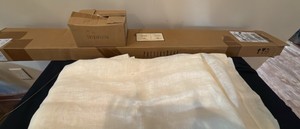 pottery barn collection of two curtains measuring 56 x 96 one curtain rod that measures up to 120 inches and the decorative fins that go on the end