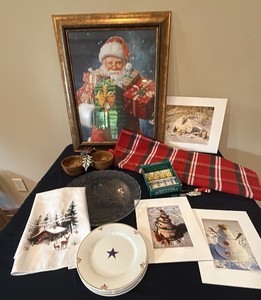 holiday decorations to include a beautiful picture of Santa,  original art SeaSeller photographs, plate, Rug, butter spreaders, and dip bowl
