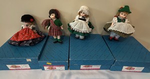 Madame Alexander international girl doll series, one representing Germany, Scotland, Austria, and Ireland