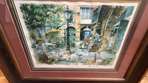 this is a limited edition , color print titled Coffee and Gossip by artist Tommie Thomsen.  The picture is placed in the French Quarter of New Orleans in 1994. signed by the artist