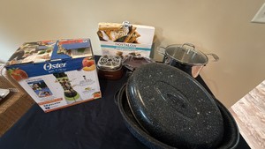 small kitchen appliances lot , including Oster Blender, electric smore maker, cooking pot and roasting pan