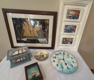 Ocean collection including pictures, plate, boxes, and clock