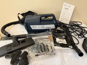 SupraQuik portable canister vacuum by Riccar with all the accessories