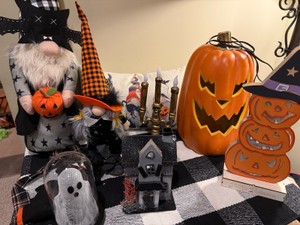 Gnome Halloween with decorations, pillow, light up pumpkin and checkered rug