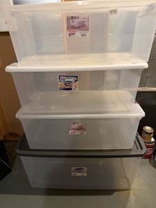 Four Sterilite Plastic Storage Bins
