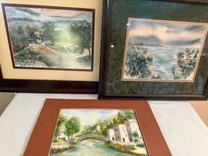 Three original framed watercolor paintings of cabin, lake view and bridge
