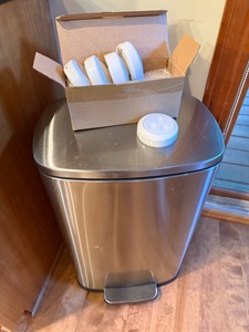 Stainless Steel Trashcan and Box of remote controlled puck lights
