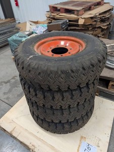 Firestone 7.50-16LT Tubeless Tires on Orange Rims (Lot of 4)